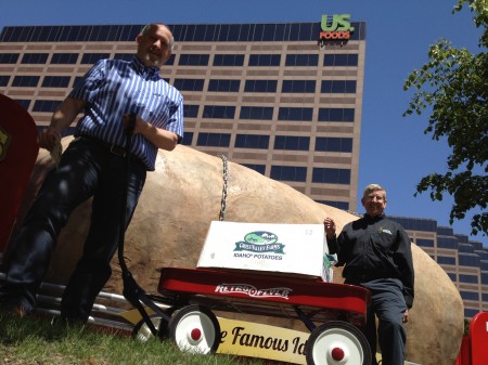 The little red wagon in front of the big red wagon!